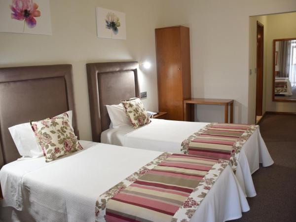 Lusitana Hotel : photo 5 de la chambre chambre lits jumeaux