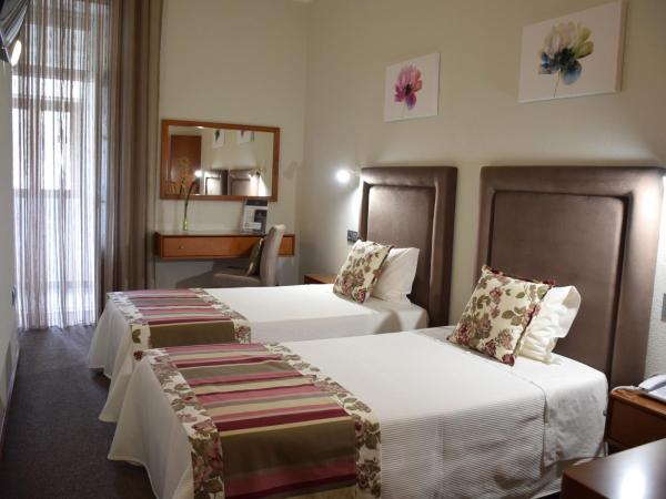 Lusitana Hotel : photo 4 de la chambre chambre lits jumeaux