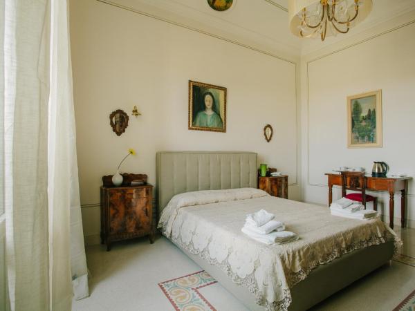 Dimora Archimedea : photo 3 de la chambre chambre lit king-size deluxe