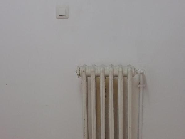 Hostal Lima : photo 3 de la chambre chambre lits jumeaux avec lit d'appoint et balcon