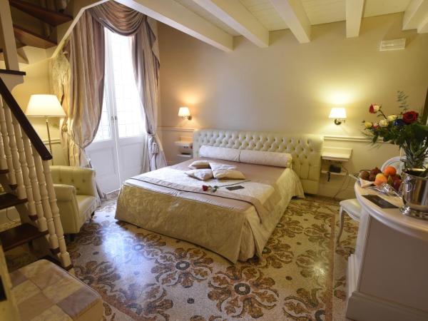 Suite Hotel Santa Chiara : photo 6 de la chambre chambre quadruple en duplex