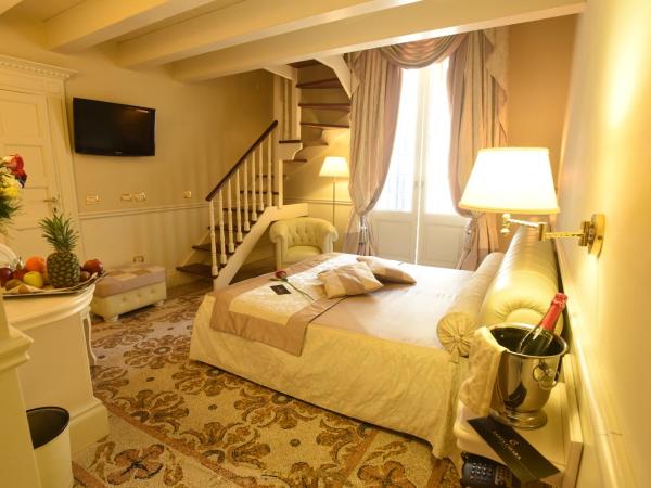 Suite Hotel Santa Chiara : photo 5 de la chambre chambre quadruple en duplex