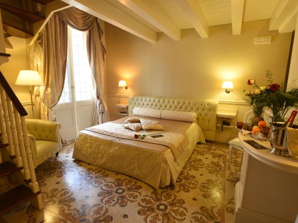 Suite Hotel Santa Chiara : photo 4 de la chambre chambre quadruple en duplex