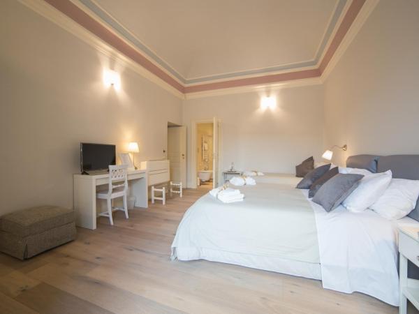 Il Leone Blu : photo 2 de la chambre chambre quadruple supérieure 