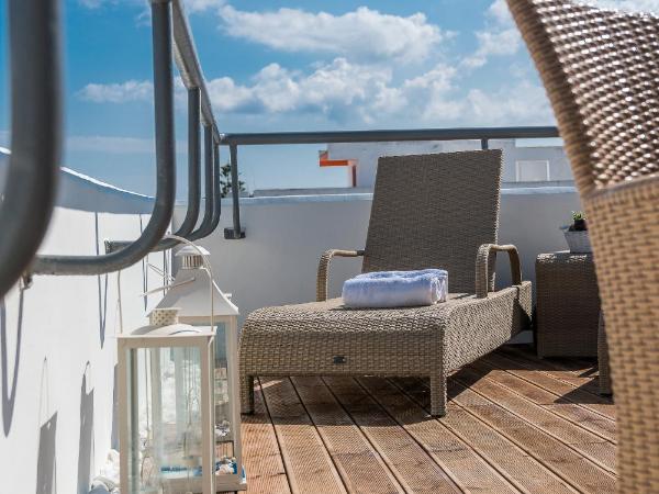 City Center Hotel : photo 9 de la chambre suite avec jacuzzi en plein air (ou bain à remous/baignoire spa)