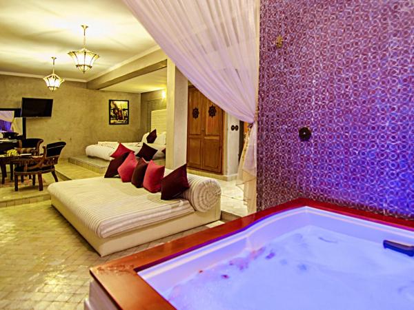 Palais Ommeyad Suites & Spa : photo 2 de la chambre suite avec jacuzzi