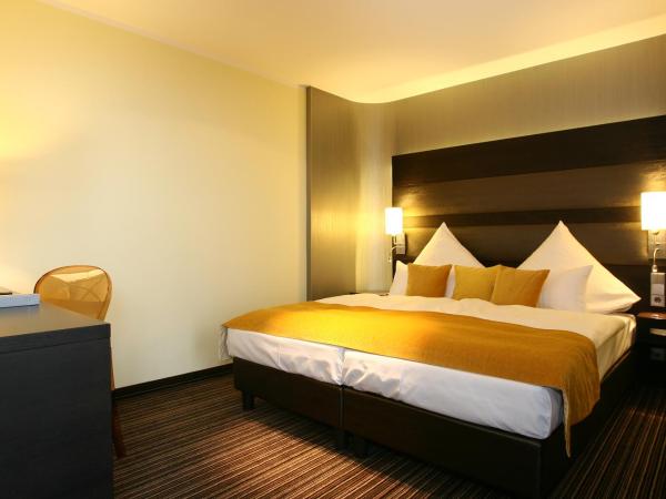 Congress Hotel am Stadtpark : photo 1 de la chambre grande chambre double supérieure