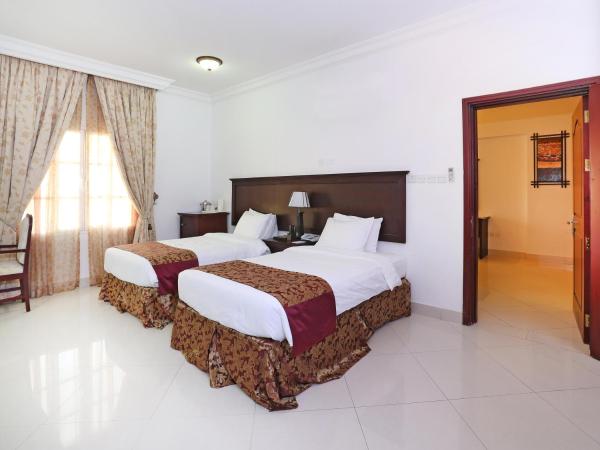 Al Maha Int Hotel Oman : photo 5 de la chambre chambre lits jumeaux deluxe