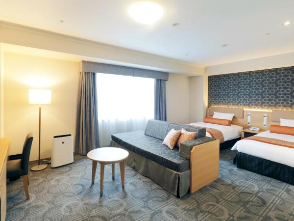 Sapporo Excel Hotel Tokyu : photo 1 de la chambre chambre lits jumeaux supérieure avec lit d'appoint - non-fumeurs - Étage avec vue sur excel
