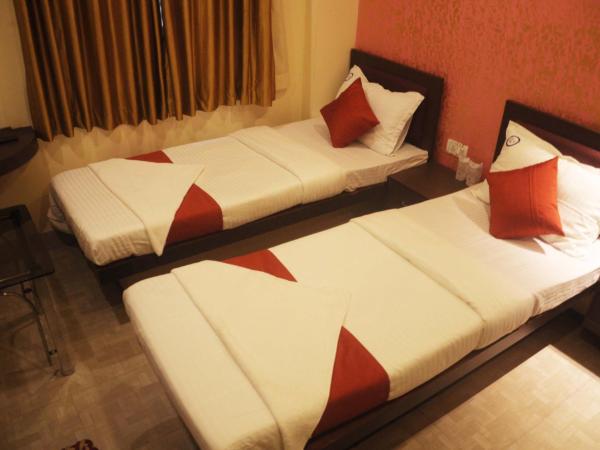 Golden Heaven Hotel : photo 2 de la chambre chambre lits jumeaux deluxe