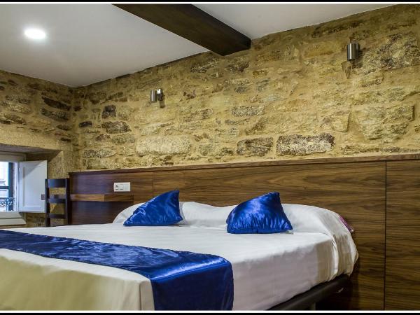 Oxford Suites Santiago de Compostela : photo 1 de la chambre chambre lits jumeaux deluxe