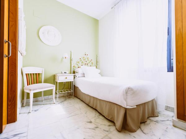 Basic Hotel Doña Manuela : photo 2 de la chambre chambre simple