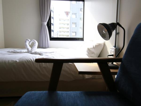 Wise Owl Hostels Shibuya : photo 9 de la chambre chambre double avec salle de bains commune