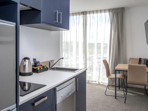 Ramada Suites by Wyndham Albany : photo 4 de la chambre appartement 1 chambre