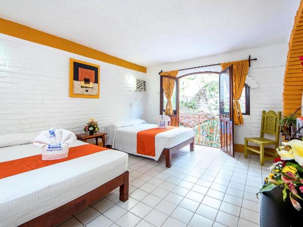 Hotel Hacienda de Vallarta Centro : photo 1 de la chambre chambre familiale avec climatisation