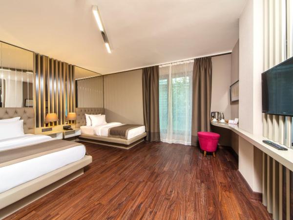 The City Suites : photo 10 de la chambre chambre deluxe