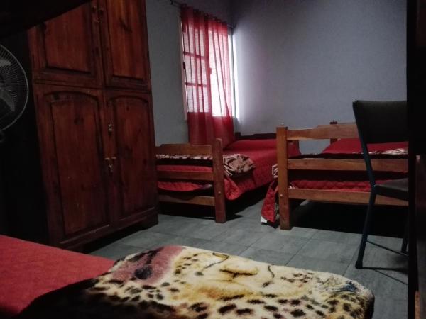 Hostal Namaste : photo 4 de la chambre chambre quadruple avec salle de bains privative séparée