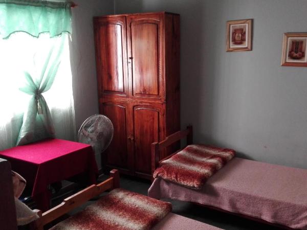 Hostal Namaste : photo 3 de la chambre chambre quadruple avec salle de bains privative séparée