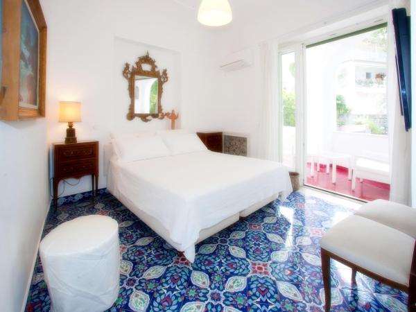 Villa Silia : photo 1 de la chambre suite lit king-size - vue sur mer