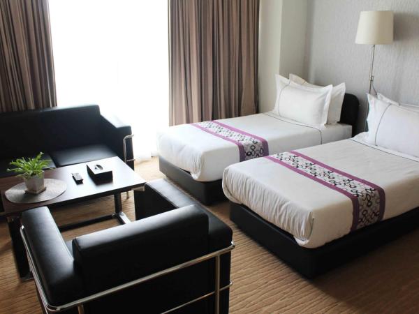 Symphony Suites Hotel : photo 2 de la chambre chambre familiale premier