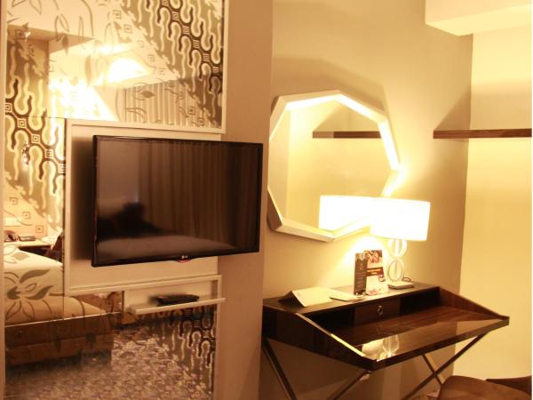 Aston Bellevue Radio Dalam : photo 5 de la chambre chambre exécutive