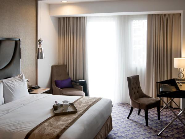 Aston Bellevue Radio Dalam : photo 4 de la chambre chambre lit king-size deluxe