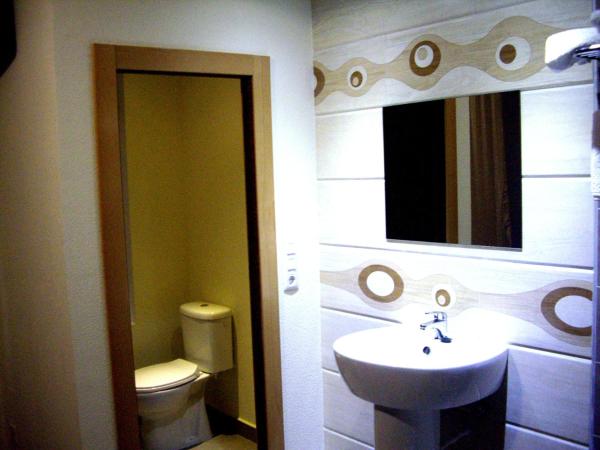 Hostal Conde David : photo 9 de la chambre suite avec baignoire spa