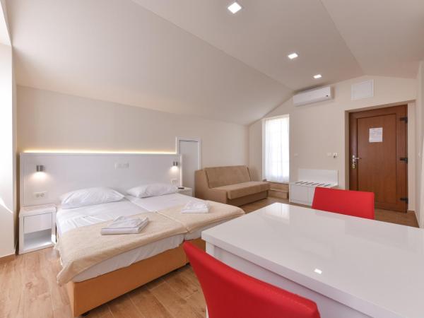 Idassa Atrium rooms : photo 8 de la chambre chambre double ou lits jumeaux avec balcon