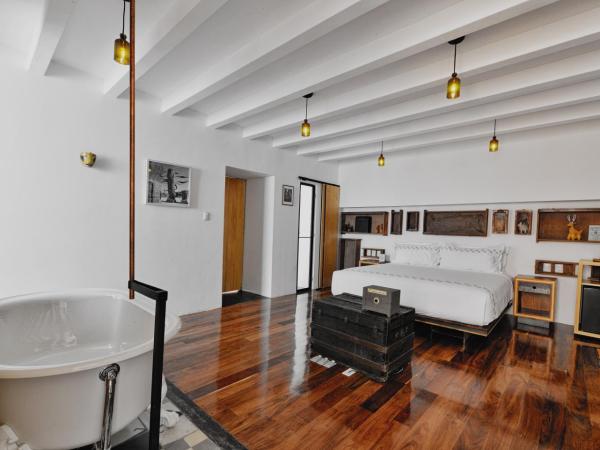 Hotel Los Amantes : photo 4 de la chambre suite supérieure lit king-size