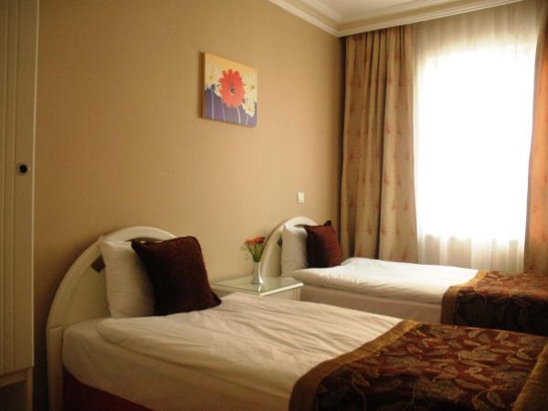 Suite Laguna Otel : photo 5 de la chambre chambre familiale (4 adultes)