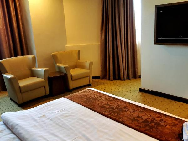 Lintas View Hotel : photo 1 de la chambre chambre lit king-size exécutive