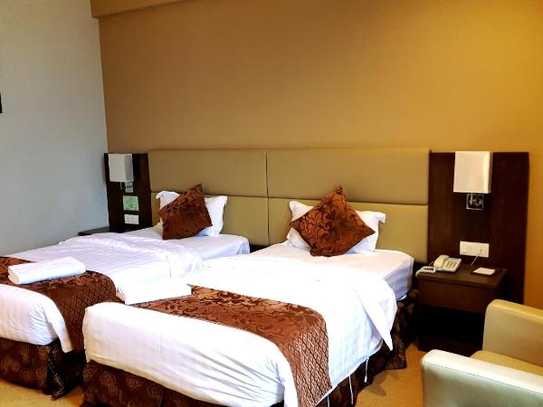 Lintas View Hotel : photo 2 de la chambre chambre lits jumeaux exécutive