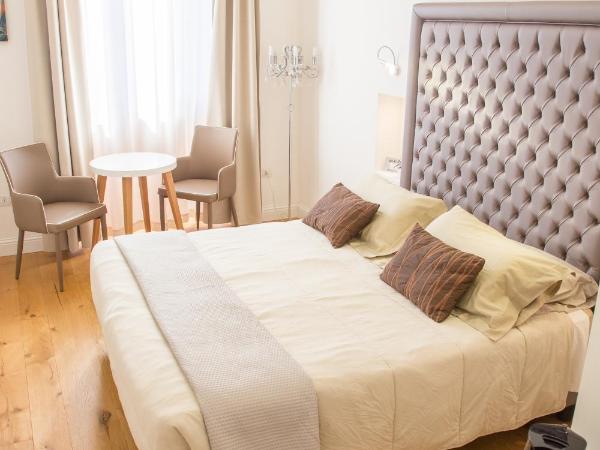 Antico Corso Charme : photo 5 de la chambre chambre double ou lits jumeaux deluxe - vue sur ville 