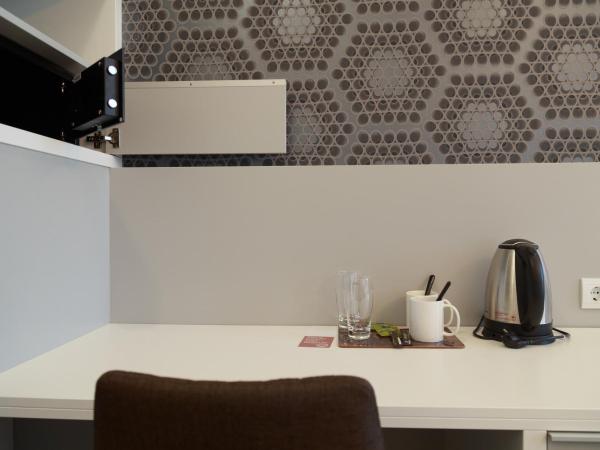 Hotel Mika Downtown : photo 2 de la chambre chambre deluxe double ou lits jumeaux