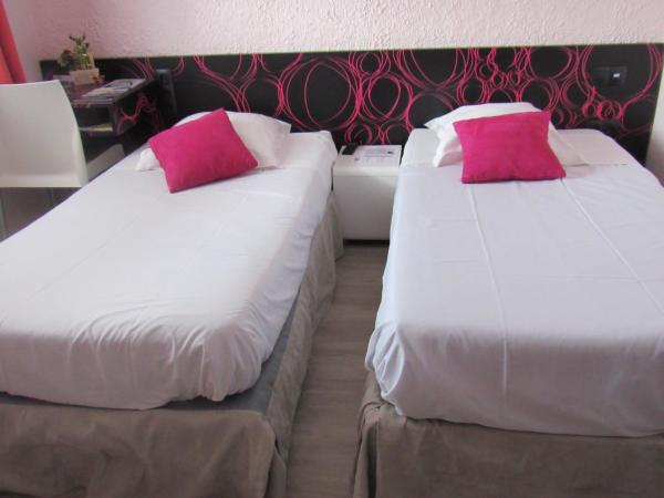 Citotel Les Sternes : photo 3 de la chambre chambre triple avec lits simples