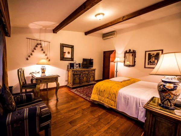 Hotel La Mansion del Sol : photo 10 de la chambre chambre lit king-size