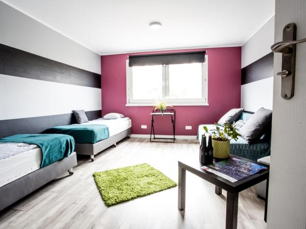 Tetris Sopot : photo 4 de la chambre chambre quadruple avec salle de bains privative