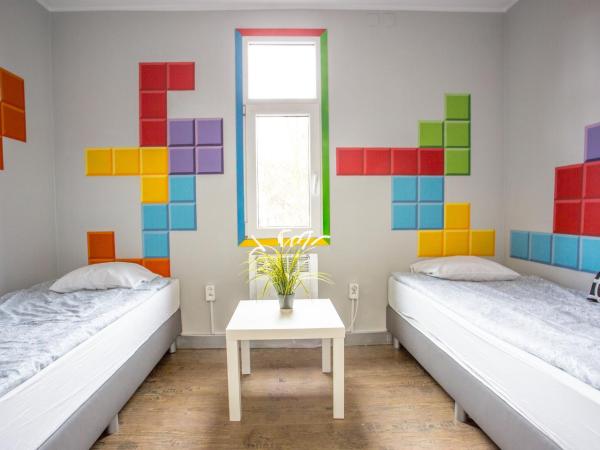 Tetris Sopot : photo 2 de la chambre chambre lits jumeaux avec salle de bains commune