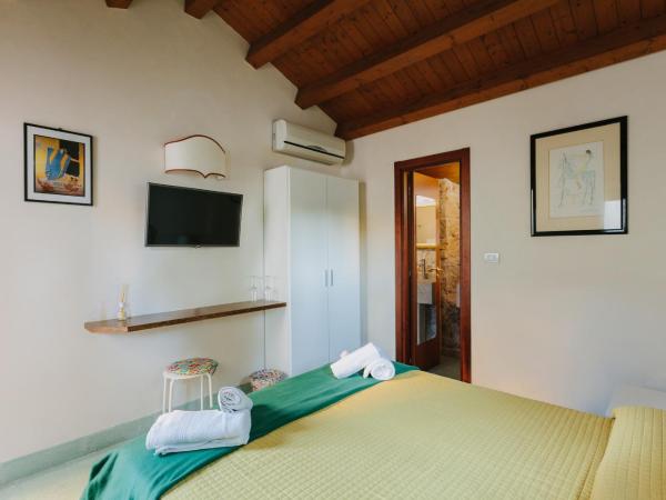 Dimora Archimedea : photo 5 de la chambre chambre deluxe