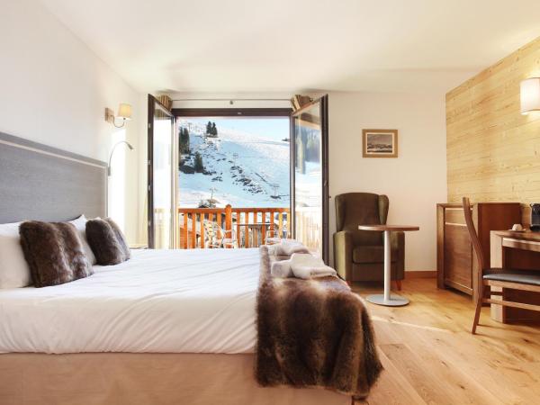 Hôtel Prestige Odalys Le Chamois : photo 2 de la chambre chambre double avec 1 accès au spa