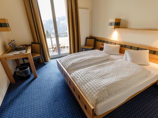 Arenas Resort Victoria-Lauberhorn : photo 1 de la chambre chambre double confort