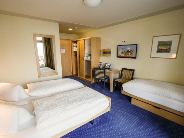 Arenas Resort Victoria-Lauberhorn : photo 4 de la chambre chambre triple