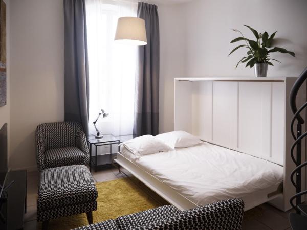 La Résidence Arles Centre : photo 5 de la chambre appartement en duplex - 1er Étage côté rue