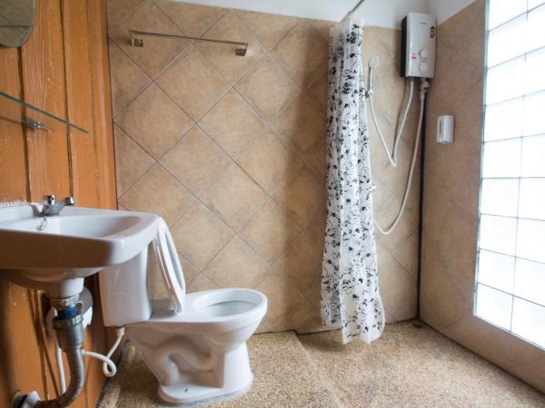 Tropical Garden Bungalow : photo 2 de la chambre petite chambre lits jumeaux standard avec climatisation