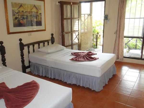 Tropical Garden Bungalow : photo 6 de la chambre hébergement lits jumeaux avec climatisation - vue sur jardin