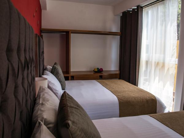 Hotel Casa Aurora : photo 2 de la chambre chambre avec 2 grands lits queen-size
