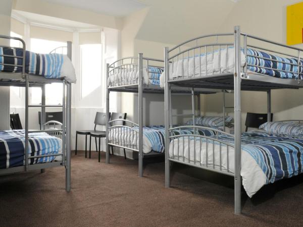 The Hostel : photo 6 de la chambre lit dans dortoir mixte de 12 lits