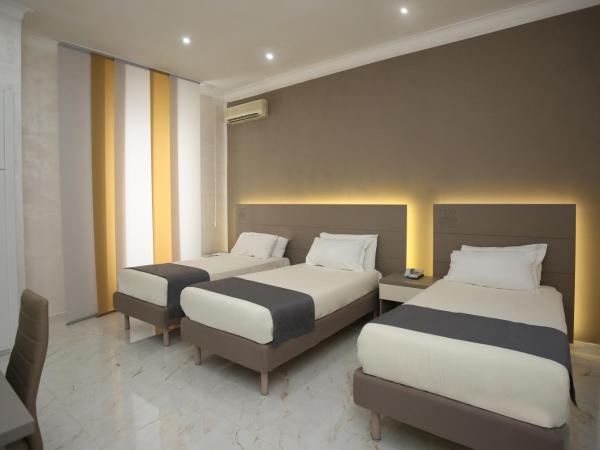 Hotel Vergilius Billia : photo 6 de la chambre chambre triple