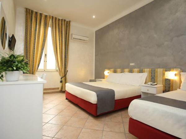 Hotel Vergilius Billia : photo 1 de la chambre chambre triple