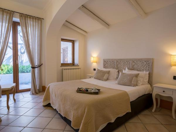Tenuta Del Poggio Antico : photo 2 de la chambre suite supérieure avec jardin privé